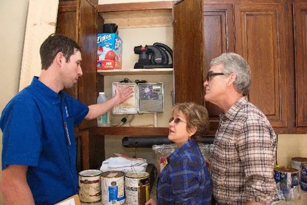 Gardener talking to clients