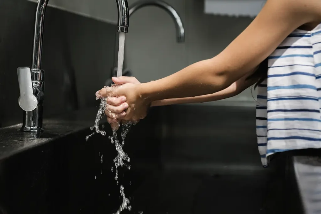 Girl washing hands