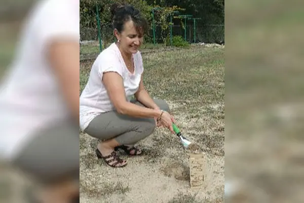 Woman tending to the garden